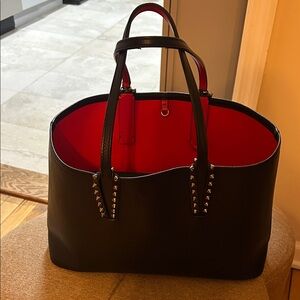 Black Tote Bag with Red Interior and Stud Accents